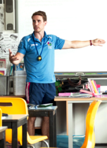 pe teacher in the classroom with students